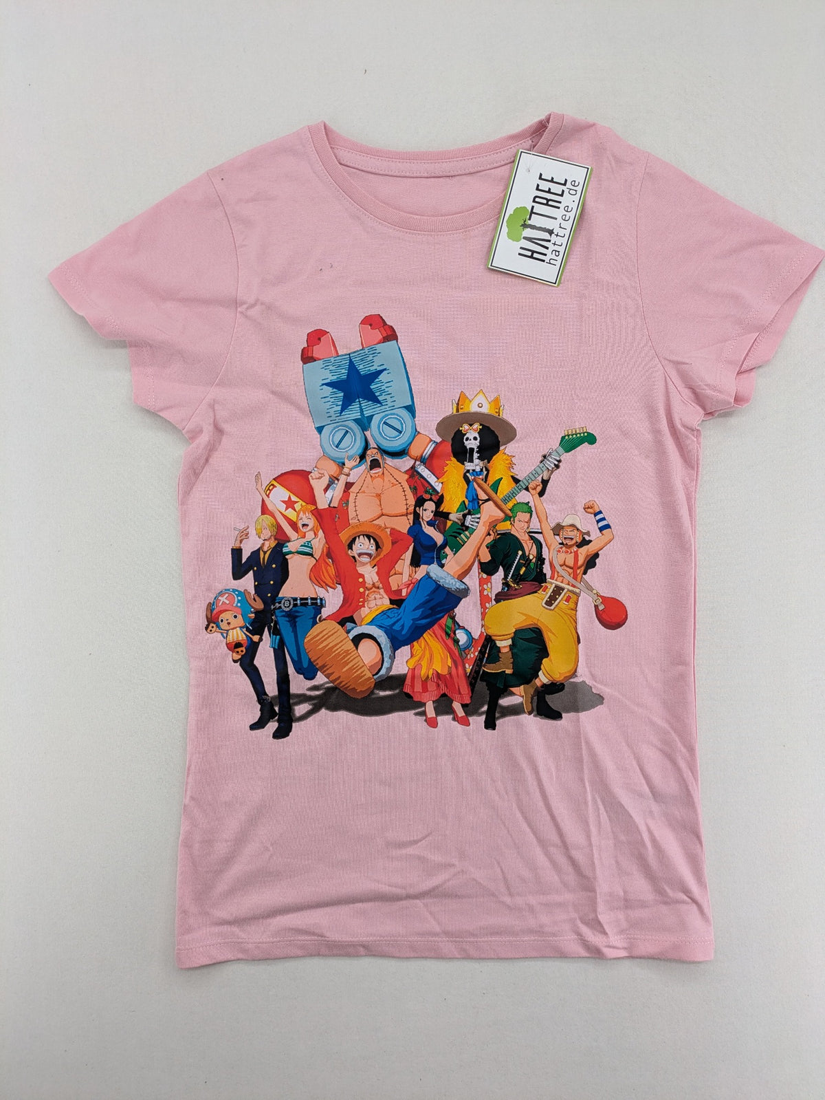 One Piece pink graphic tee featuring colorful Straw Hat crew print and classic fit.