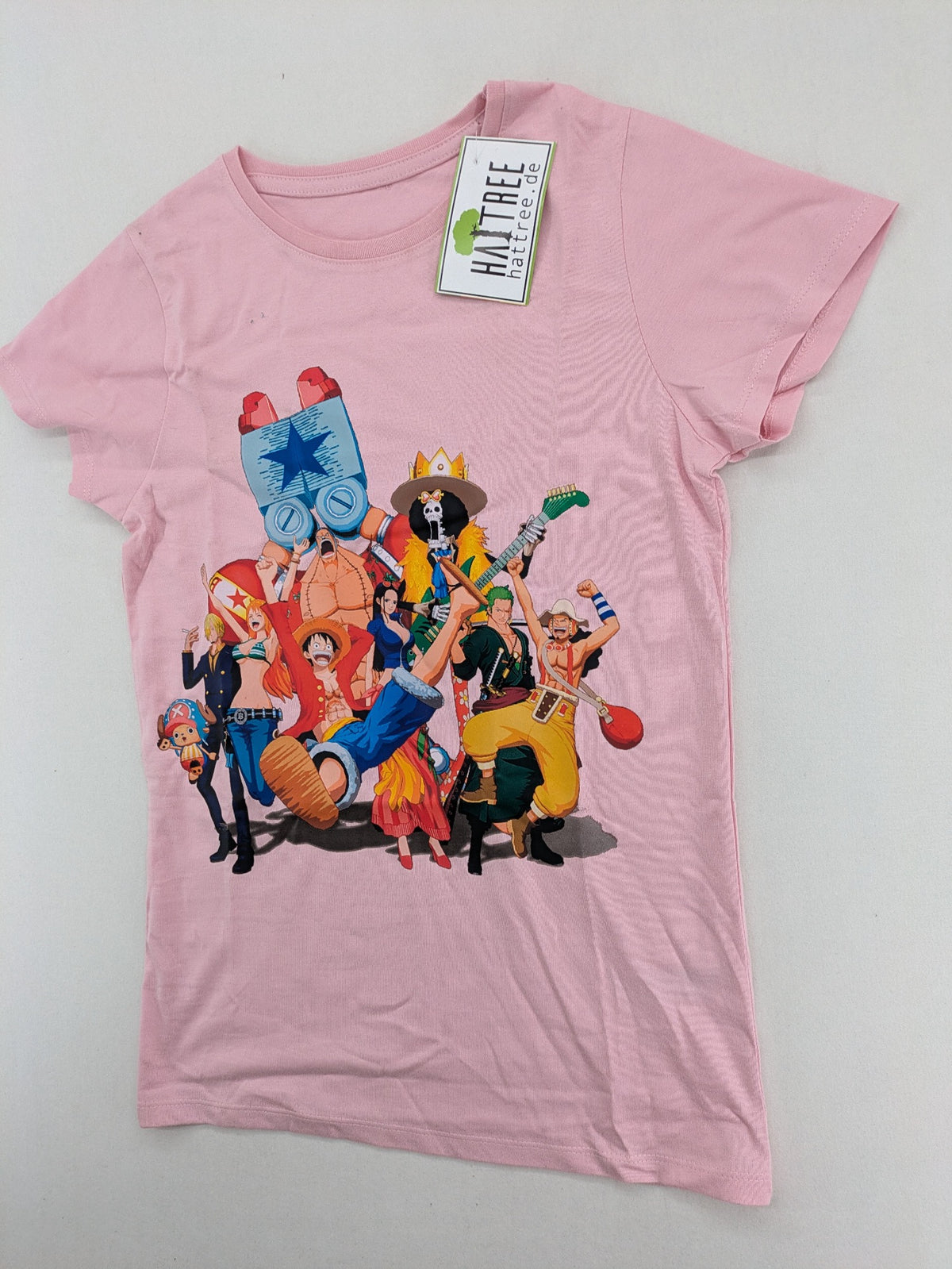 One Piece pink graphic tee featuring colorful Straw Hat crew print and classic fit.