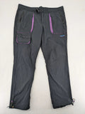 Columbia black trousers with Omni-Shield technology and contrasting purple details.