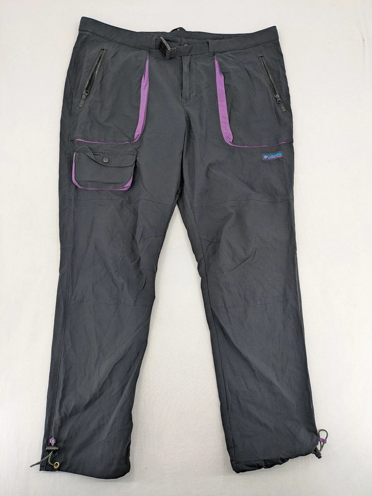 Columbia black trousers with Omni-Shield technology and contrasting purple details.