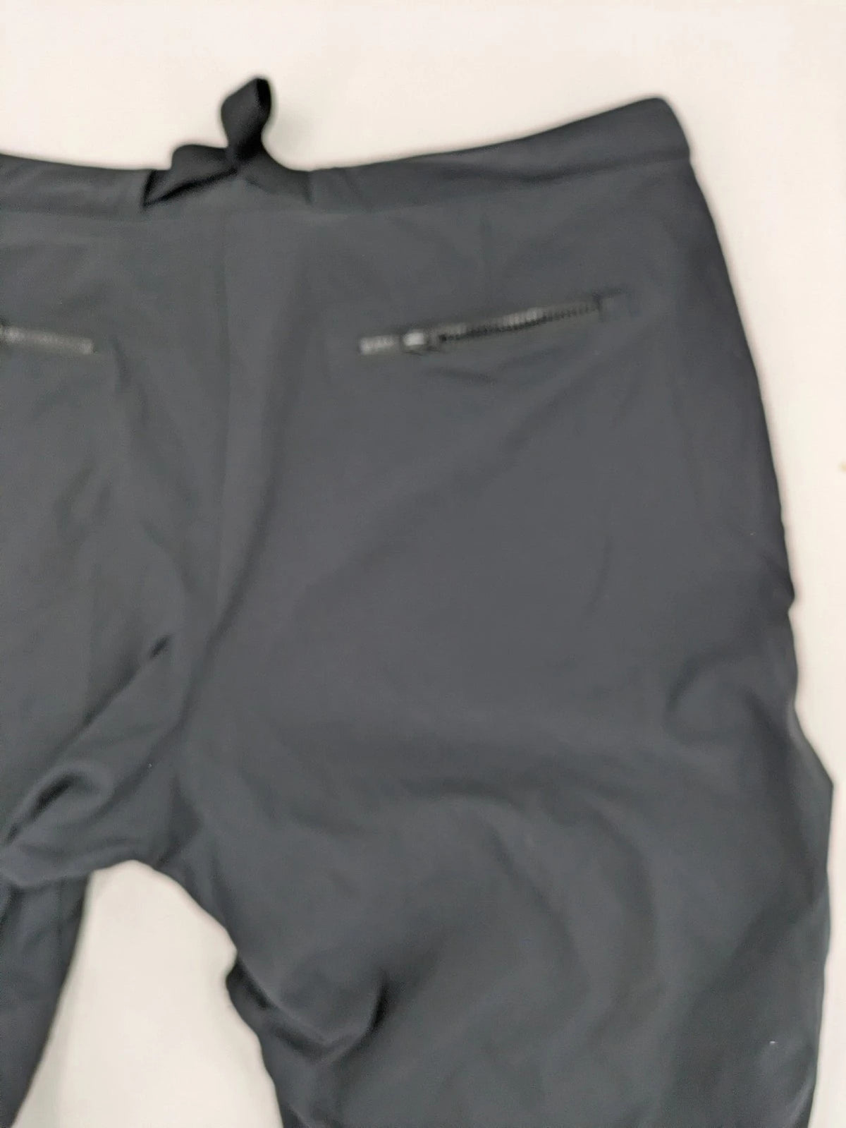 Columbia black trousers with Omni-Shield technology and contrasting purple details.