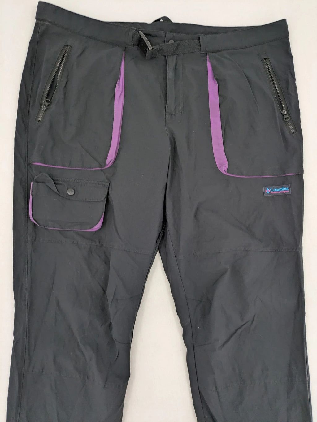 Columbia black trousers with Omni-Shield technology and contrasting purple details.