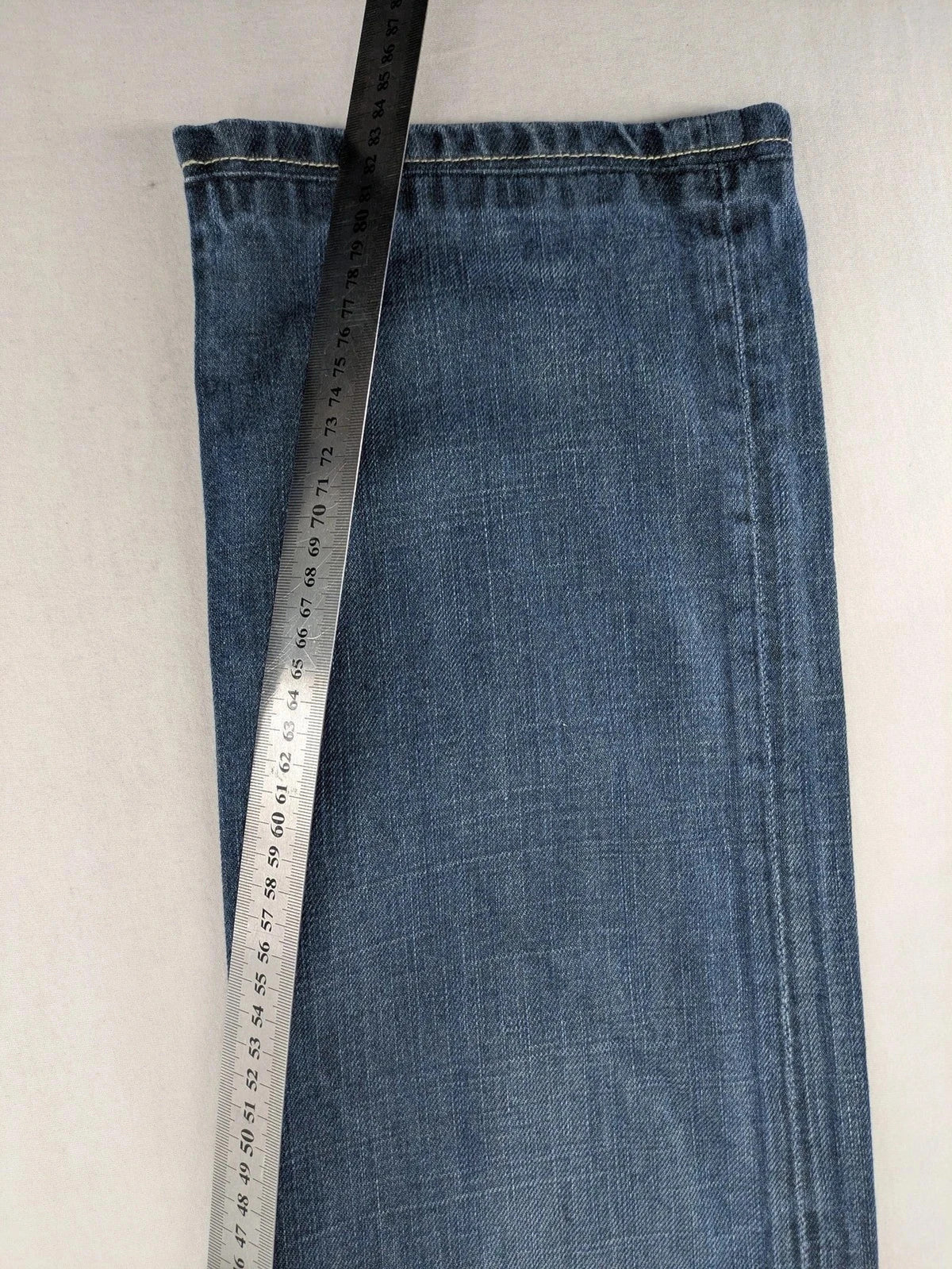 Jack & Jones blue straight jeans with button fly and classic five-pocket design.