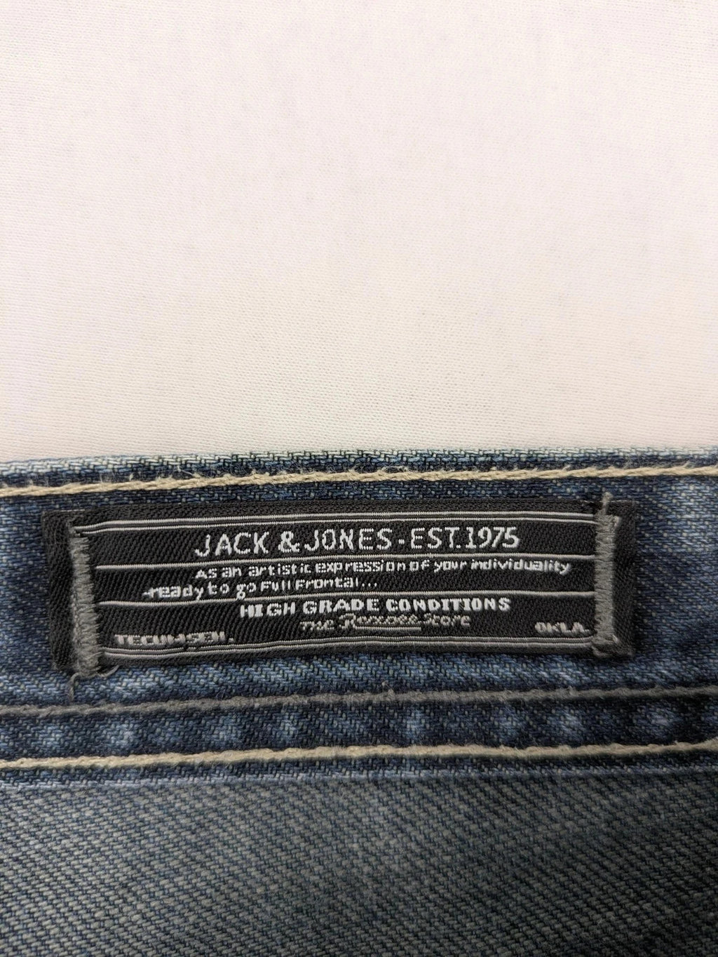 Jack & Jones blue straight jeans with button fly and classic five-pocket design.