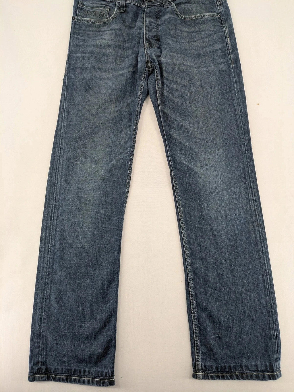 Jack & Jones blue straight jeans with button fly and classic five-pocket design.