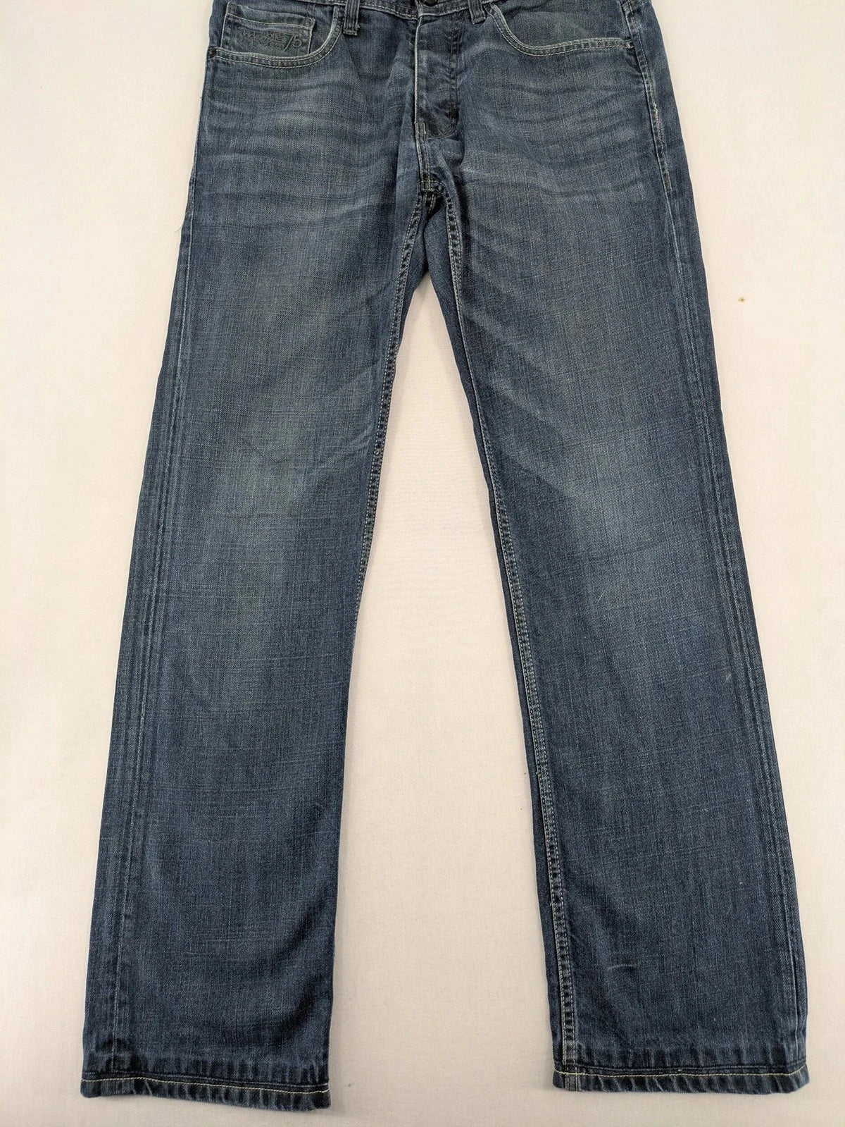 Jack & Jones blue straight jeans with button fly and classic five-pocket design.