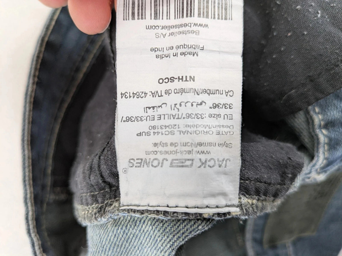 Jack & Jones blue straight jeans with button fly and classic five-pocket design.