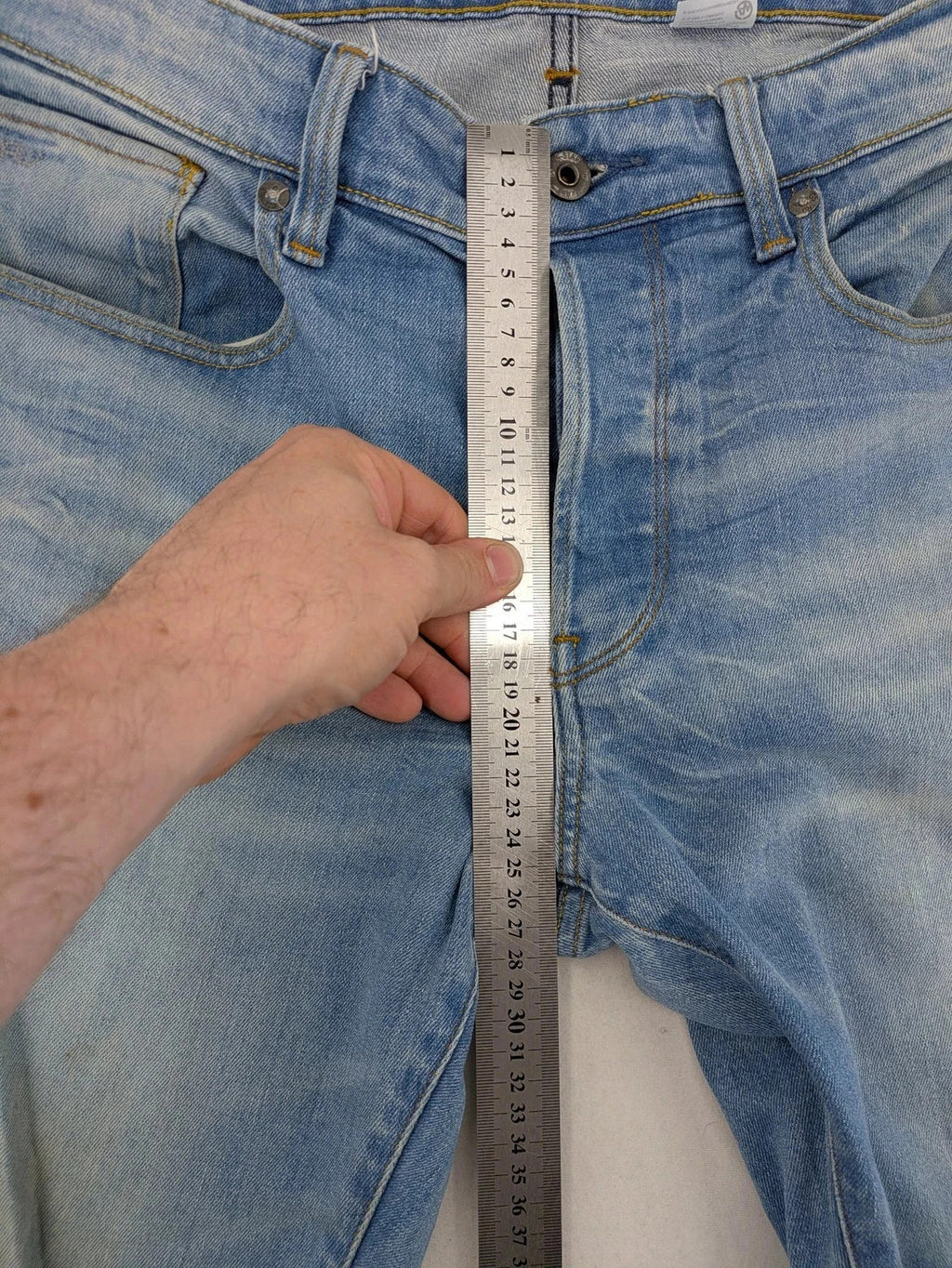 G-Star blue straight tapered jeans with classic 5-pocket design and button fly.