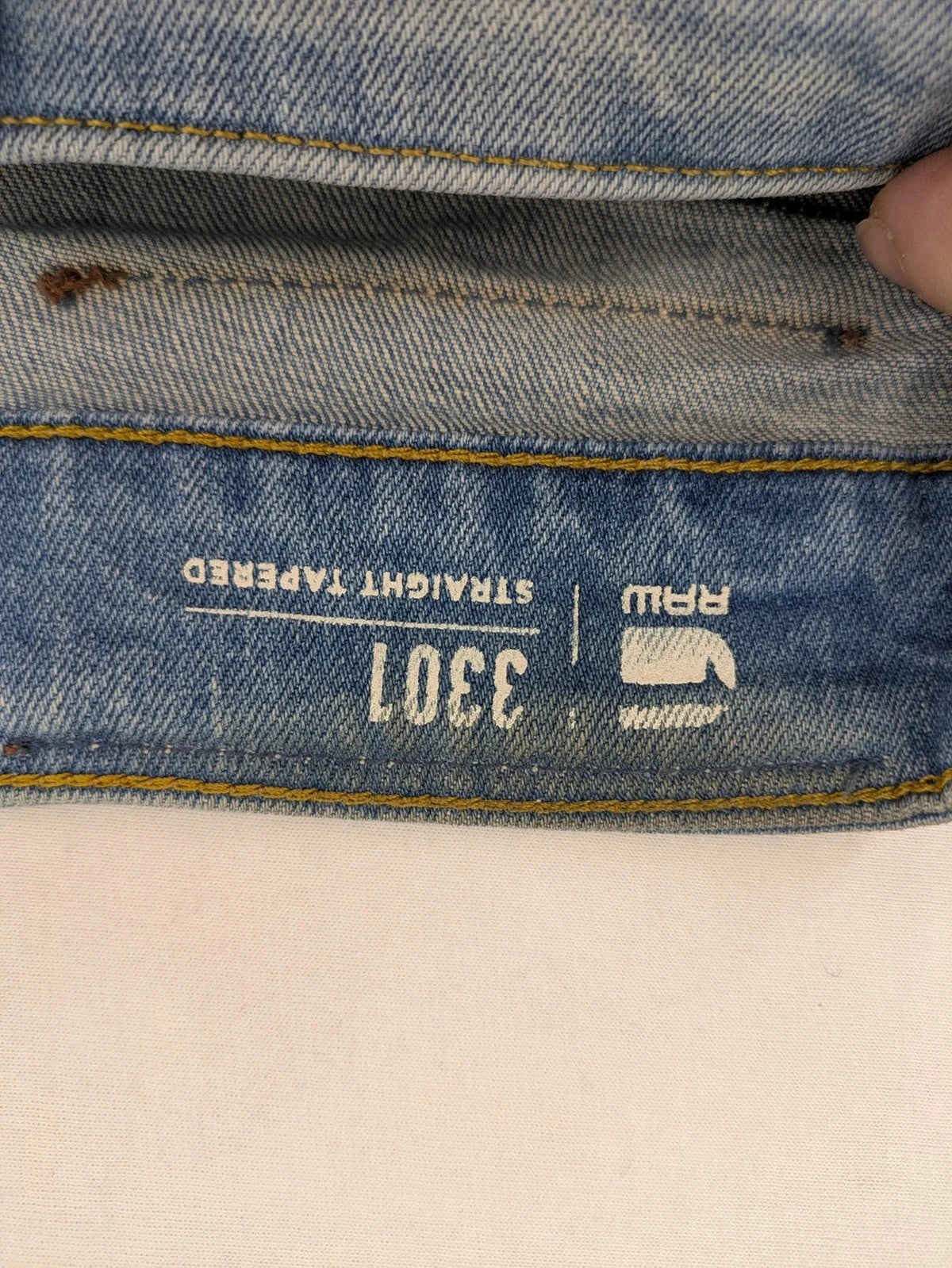 G-Star blue straight tapered jeans with classic 5-pocket design and button fly.