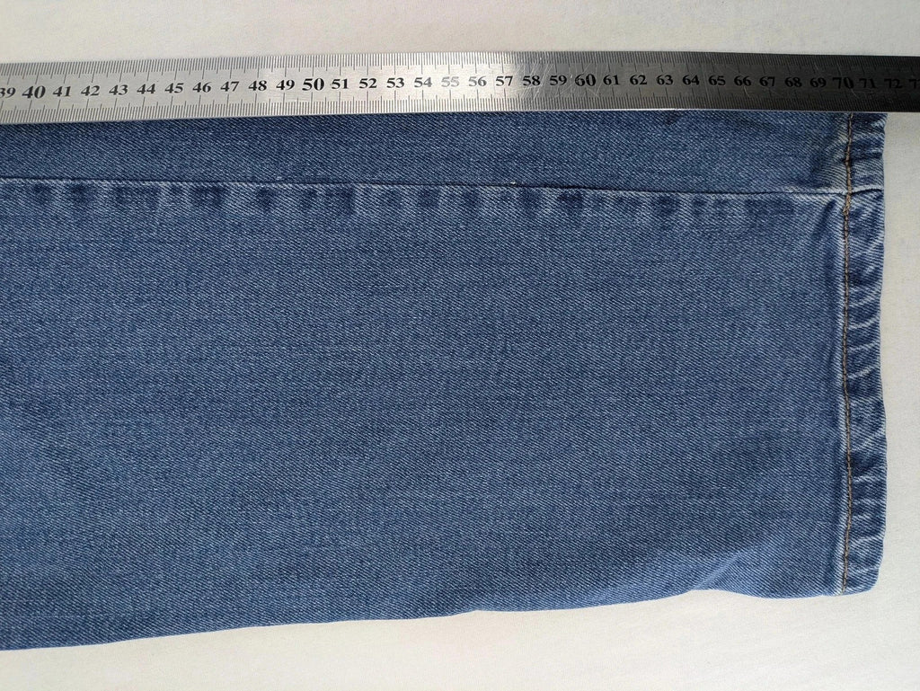 Wrangler blue straight jeans with classic wash and durable cotton-stretch blend.