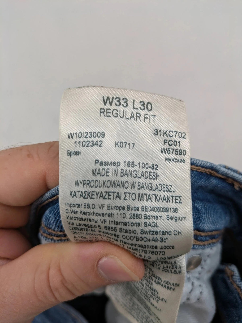 Wrangler blue straight jeans with classic wash and durable cotton-stretch blend.