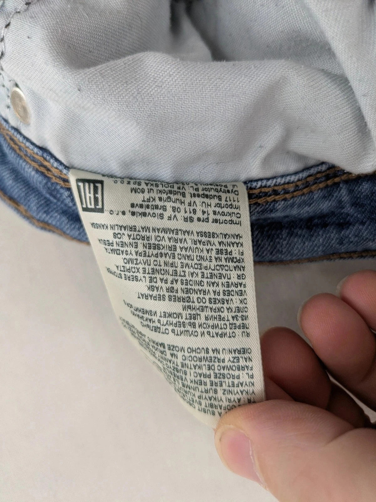 Wrangler blue straight jeans with classic wash and durable cotton-stretch blend.