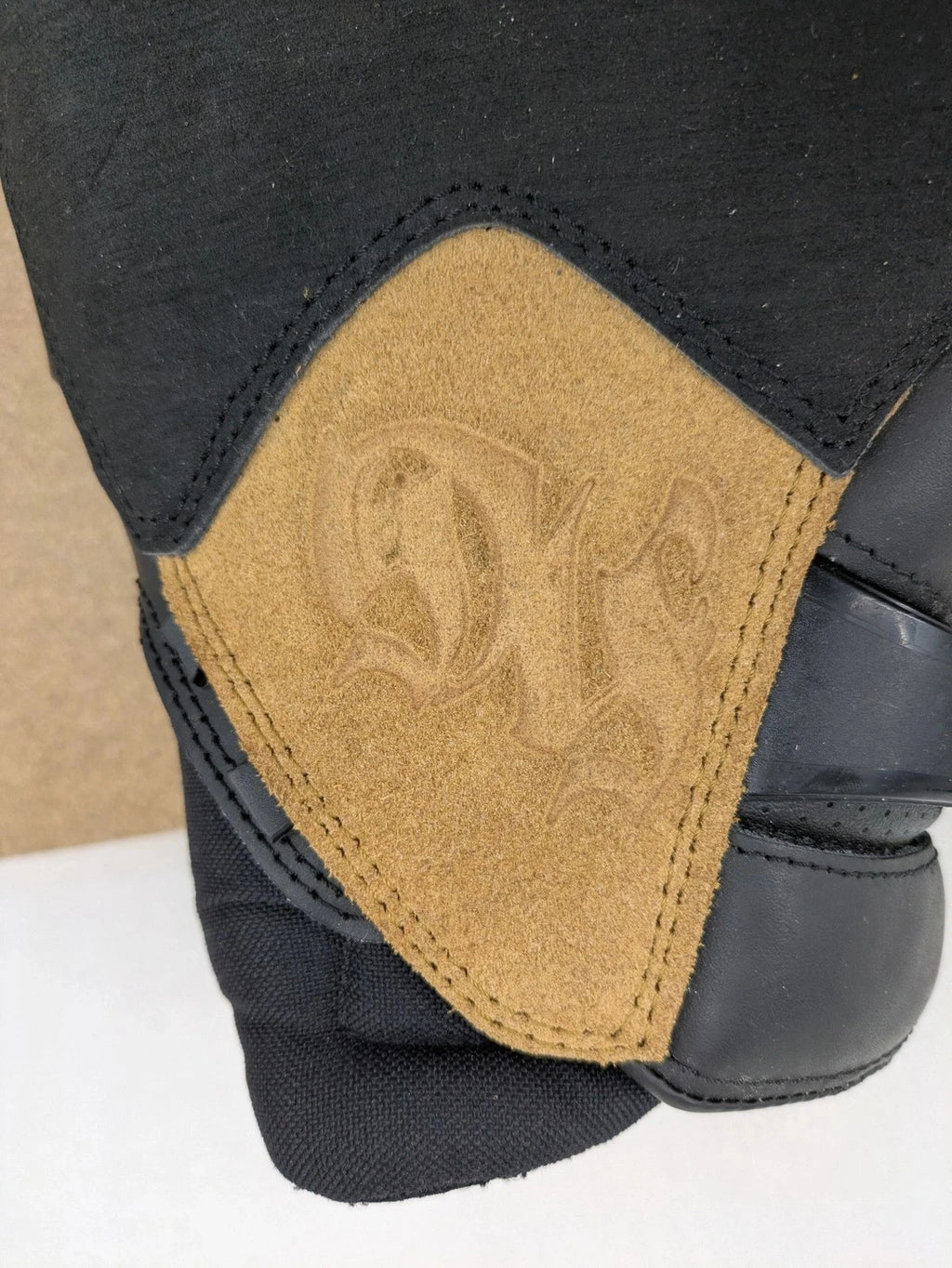 Sioux black motorcycle boots size 42 with brown suede accents and adjustable buckles.