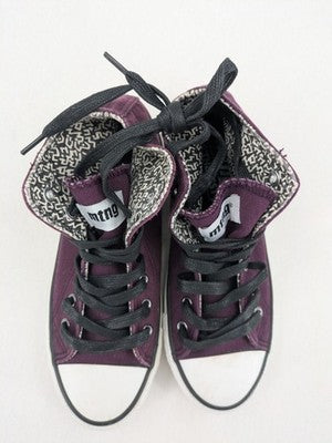 Mtng high top sneakers purple canvas with black laces and patterned white lining.