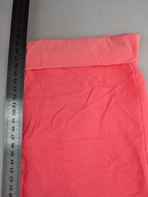 Pink Cherry pink jogpants with elastic waistband, decorative button placket, and rolled cuffs.