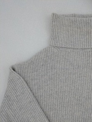 Zara Knit grey oversized roll neck jumper with ribbed texture and soft wool blend.