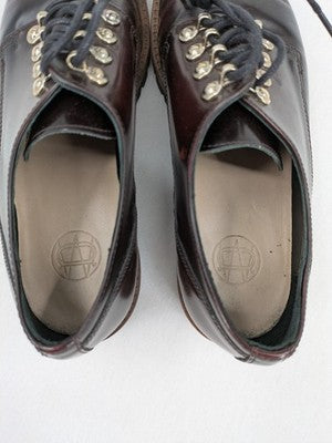 Massimo Dutti brown deck shoes glossy leather cap toe with metallic eyelets and rugged sole.