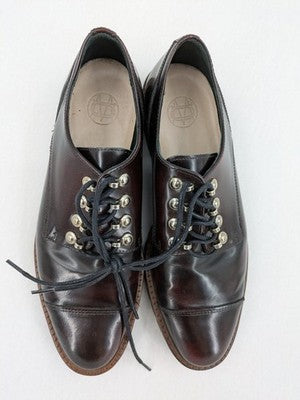 Massimo Dutti brown deck shoes glossy leather cap toe with metallic eyelets and rugged sole.