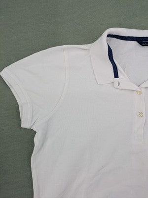 GANT white polo shirt with navy collar, embroidered logo on chest, piqué fabric.