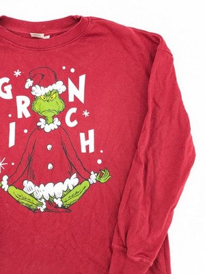 The Grinch red sweatshirt featuring large graphic of The Grinch in Santa suit