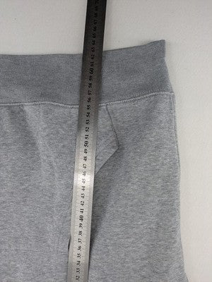 Jack & Jones grey hoodie with drawstring hood, kangaroo pocket, and ribbed cuffs.