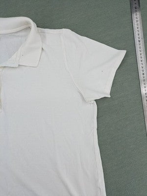 Darling Harbour white polo shirt with collar and three-button placket.