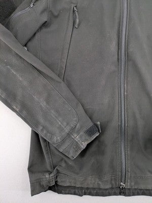 Condor grey softshell jacket with multiple pockets and adjustable hood, tactical outdoor design.