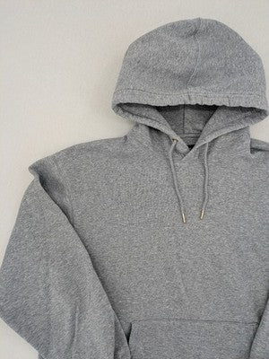 Jack & Jones grey hoodie with drawstring hood, kangaroo pocket, and ribbed cuffs.