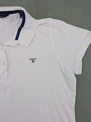 GANT white polo shirt with navy collar, embroidered logo on chest, piqué fabric.