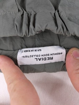 Redial cargo pants khaki green lightweight nylon with adjustable features and baggy fit