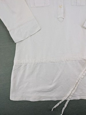 Marco Pecci white A-line dress with collar, adjustable drawstring waist, and utility pockets.