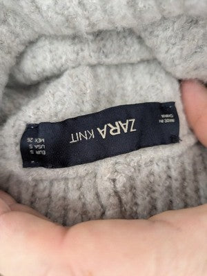 Zara Knit grey oversized roll neck jumper with ribbed texture and soft wool blend.