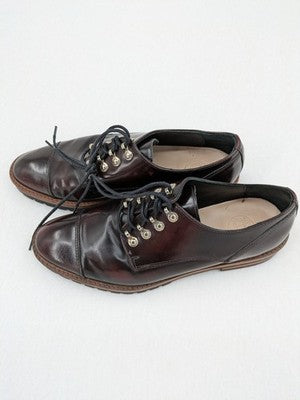 Massimo Dutti brown deck shoes glossy leather cap toe with metallic eyelets and rugged sole.