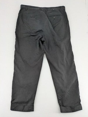 Zara grey chino pants with front pleats, rolled cuffs, and classic straight leg design.