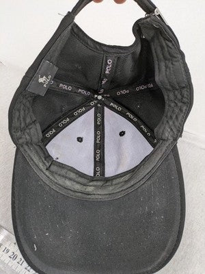 Polo black cap adjustable strapback classic design with embroidered logo and ventilation holes.
