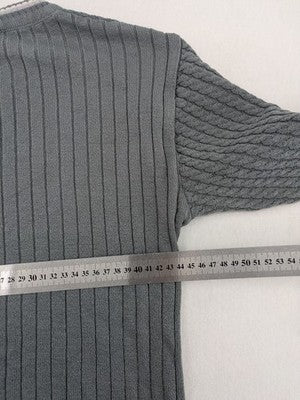 Elake grey knit jumper with V-neck, cable knit pattern and contrasting stripes.