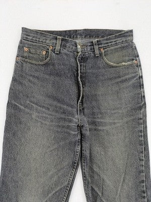 Levi's straight jeans faded black grey denim with iconic orange tab and five-pocket design.