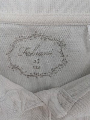 Fabiani white polo shirt with embroidered emblem, short sleeves, classic collar, button placket.