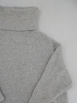 Zara Knit grey oversized roll neck jumper with ribbed texture and soft wool blend.
