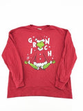 The Grinch red sweatshirt featuring large graphic of The Grinch in Santa suit