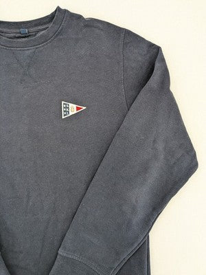 Nautica navy sweatshirt with embroidered logo on chest and patch on sleeve.