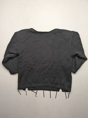 Anita black knit jumper with 3/4 sleeves, silver rhinestone accents and fringe hem.