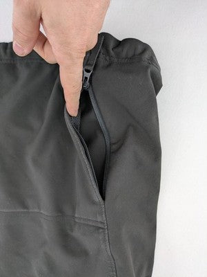 Condor grey softshell jacket with multiple pockets and adjustable hood, tactical outdoor design.
