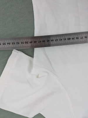 Bogner white polo shirt with classic collar and embroidered logo on chest.