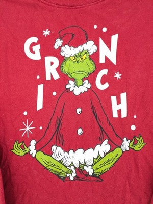 The Grinch red sweatshirt featuring large graphic of The Grinch in Santa suit