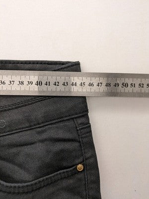Damen grey coated skinny jeans with five-pocket design and gold hardware details.