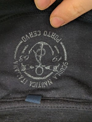 Nautica navy sweatshirt with embroidered logo on chest and patch on sleeve.