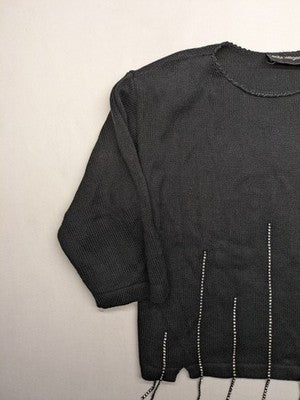 Anita black knit jumper with 3/4 sleeves, silver rhinestone accents and fringe hem.