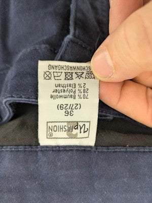Up Fashion navy pants skinny fit 5-pocket design with ankle slit and stretch material.