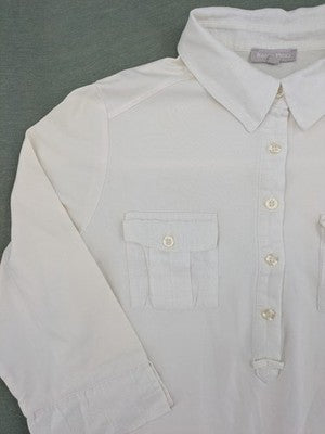 Marco Pecci white A-line dress with collar, adjustable drawstring waist, and utility pockets.